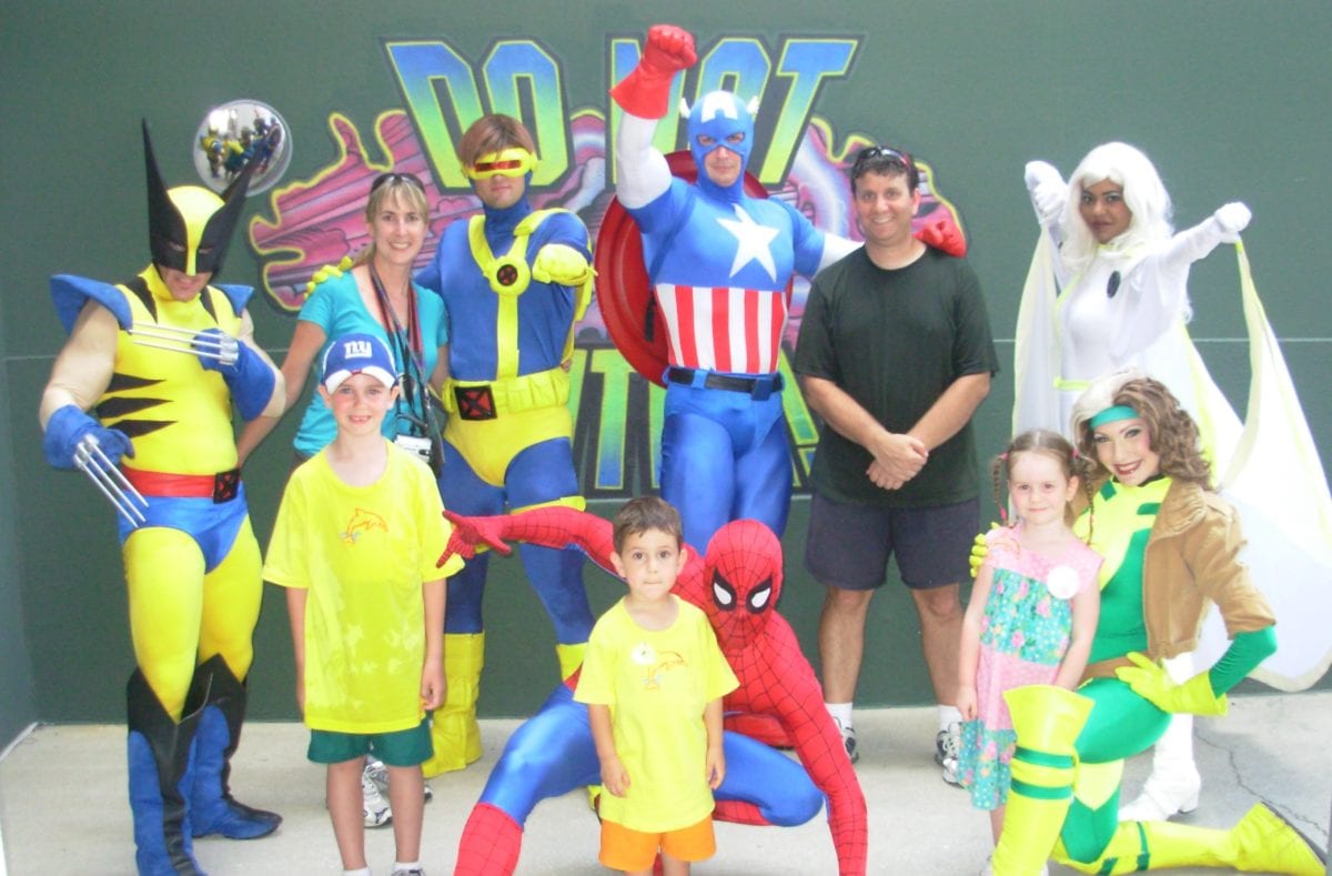 family with superheros at islands of adventure orlando