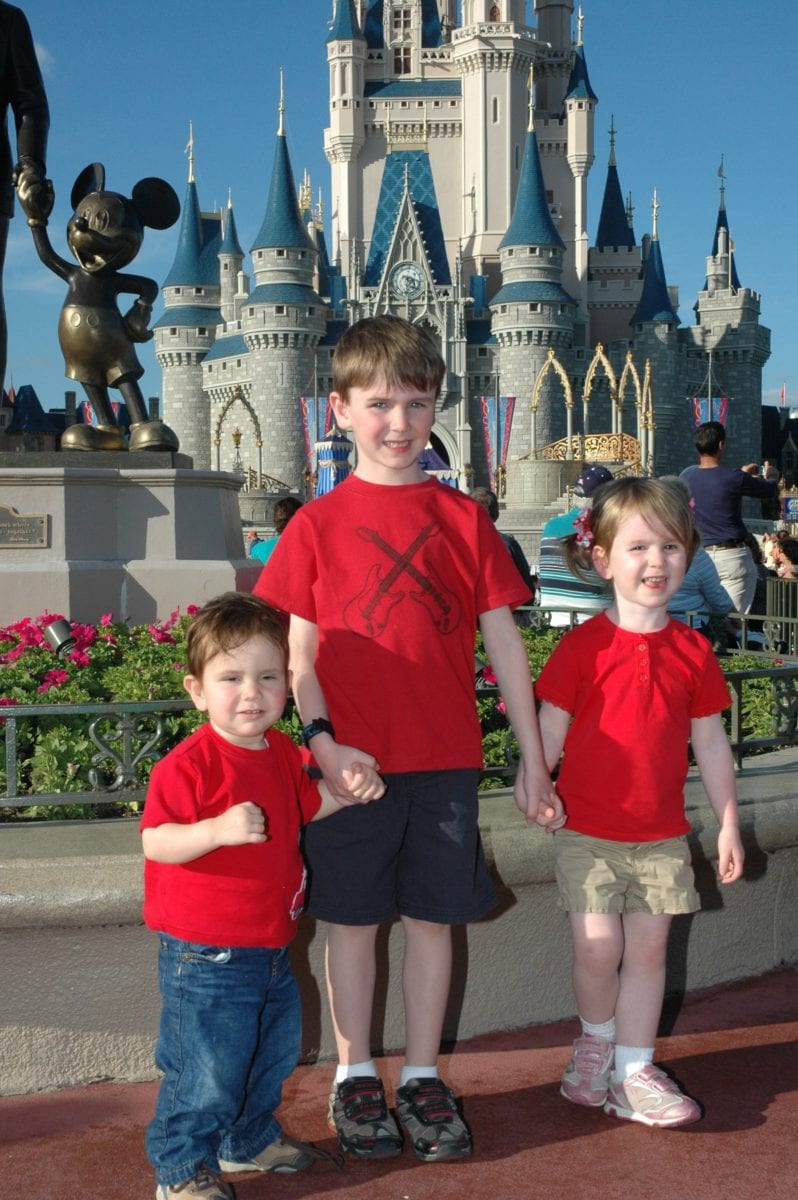 kids in front of castle Magic Kingdom Disney World