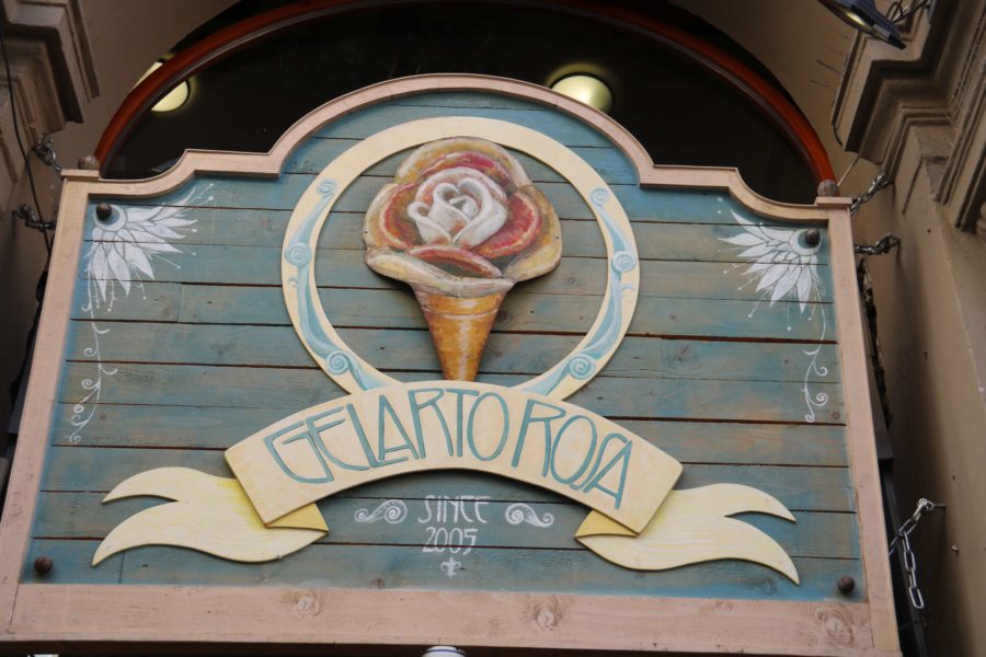 exterior sign with green background and ice cream cone at Gelarto Rosa Budapest