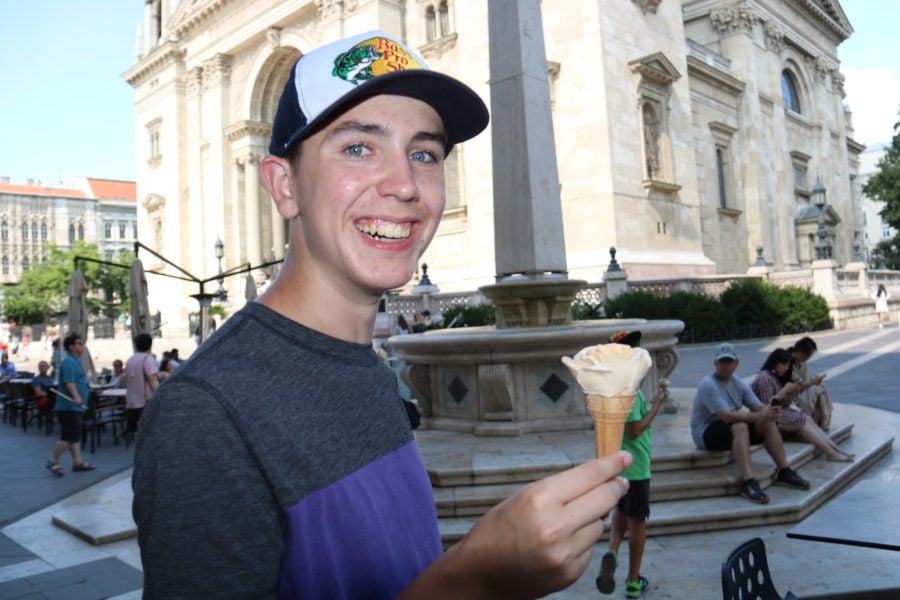 image of Lucas holding ice cream cone shaped like a rose
