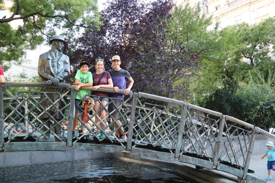 image of my kids in Budapest on small bridge with statue