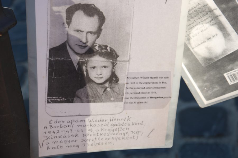 image of a dad with his little girl and the note tells of him being taken away by Hungarian police