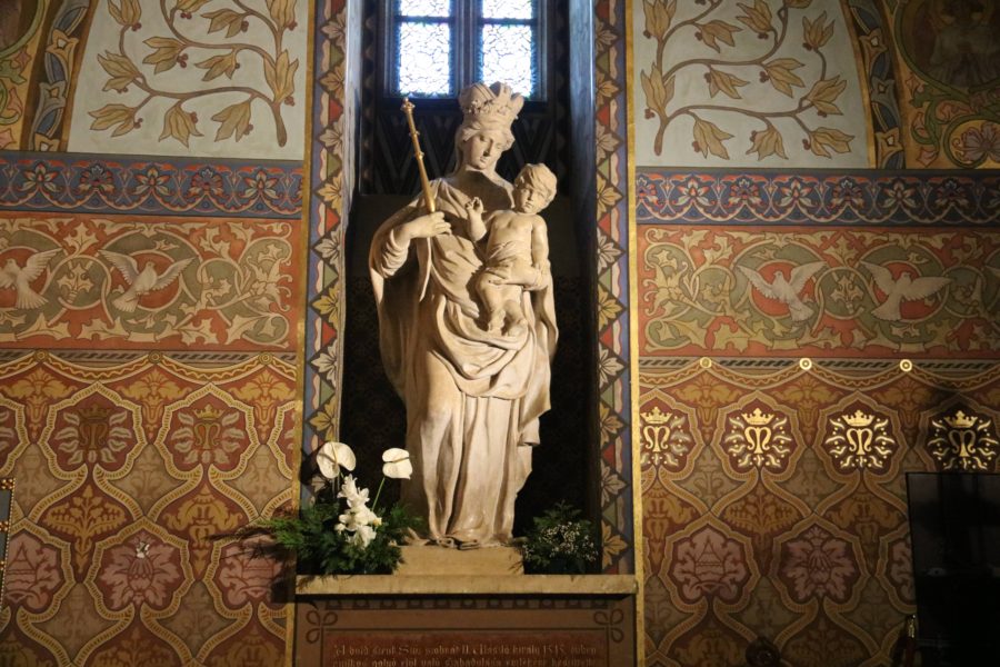 image of stone Mary with crown holding baby Jesus