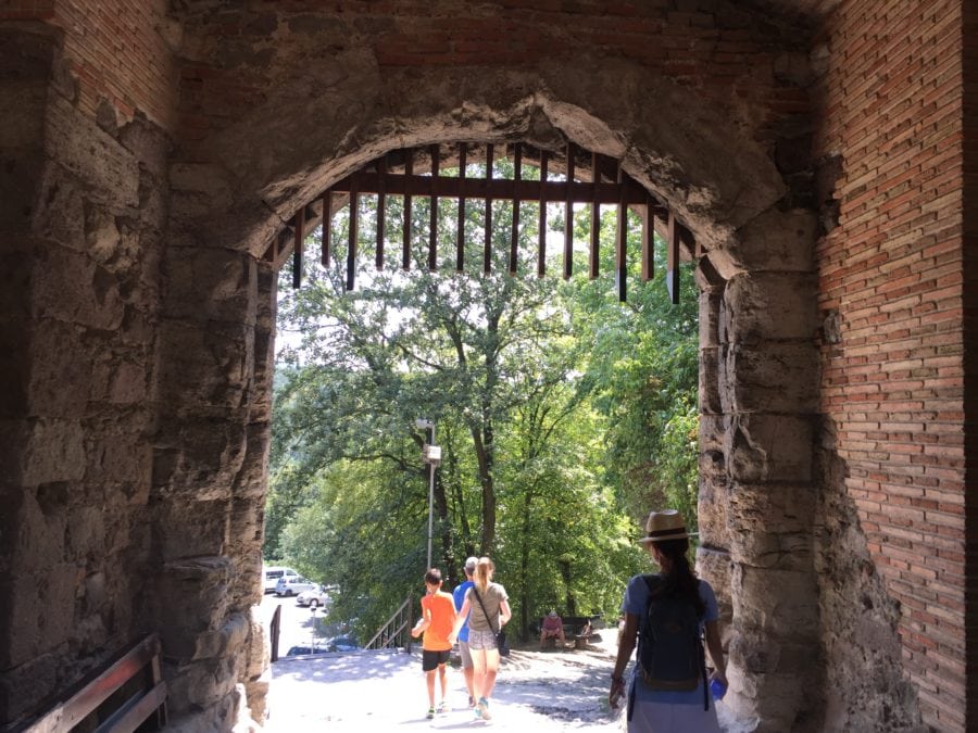 image of us walking out the castle main entrance doors on our day trip from Budapest