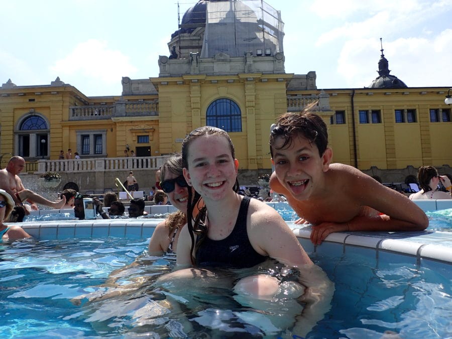 Sydney, Caiden and I snuggling and having fun in the sitting area inside the whirlpool of the Szechenyi Baths