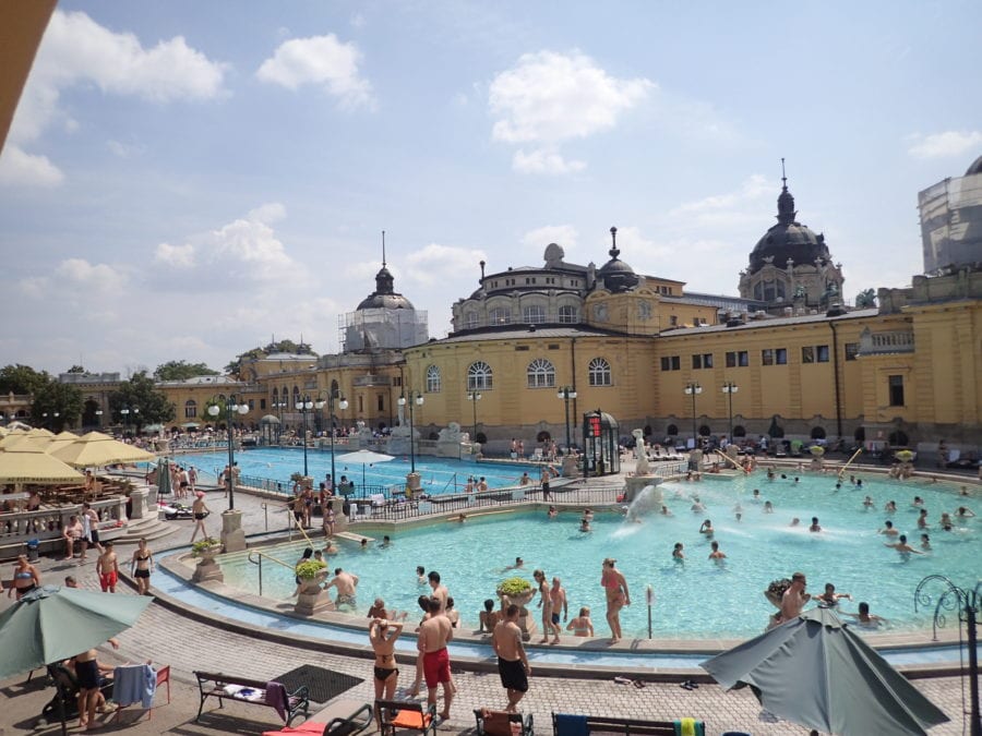 image of outdoor pools of Szechenyi Baths Budapest with kids and adults