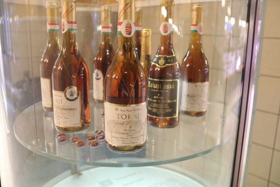 A display of different bottles of a variety of brands of Tokaji is included in amazing Budapest food