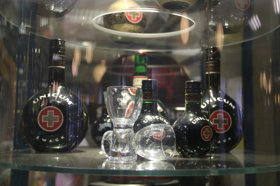 A display of different sizes of black Unicom bottles