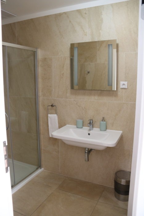 image of washroom with sink and shower