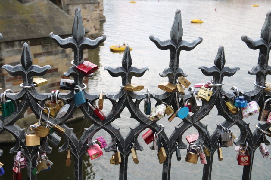 image of love locks on bridge gate