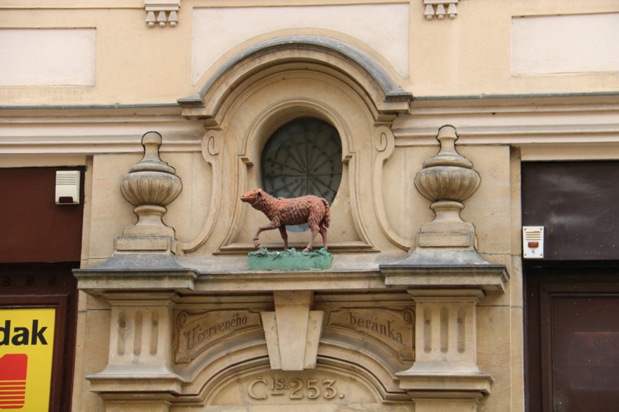image of a red lamb above a doorway at 11 Nerudova U Prague