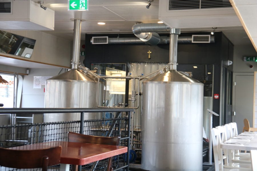 image of two large beer vats Lod Pivovar restaurant Prague
