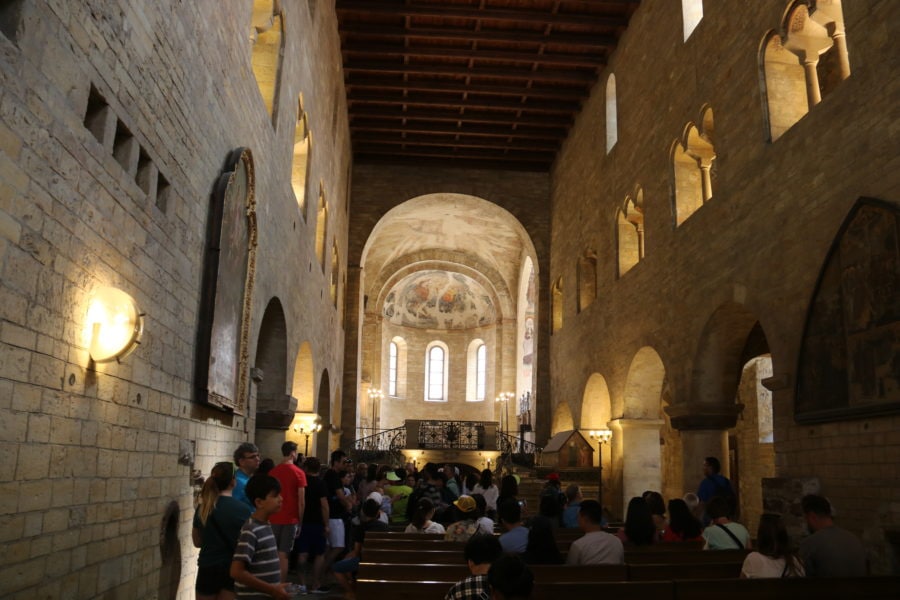 image of small church with stone walls and wooden ceiling