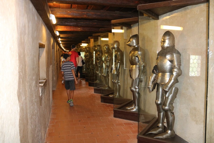 image of long corridor with armor along the side