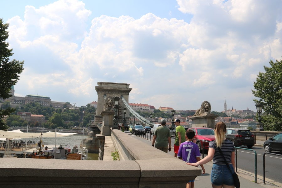 image of us walking across the Chain Bridge Budapest during our Budapest itinerary
