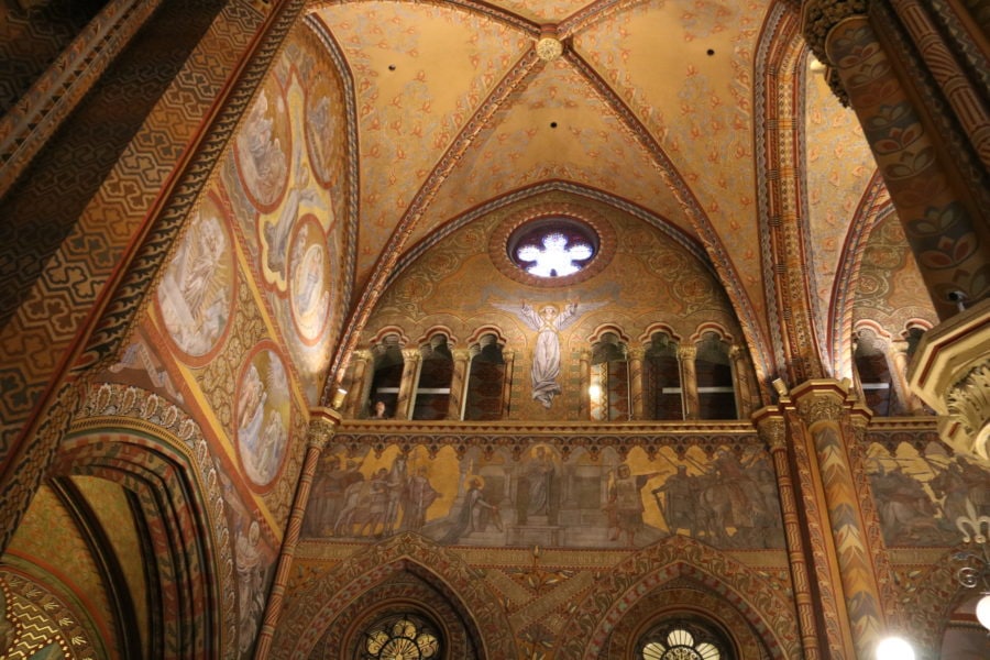 Image of beautiful painted interior and arches inside church