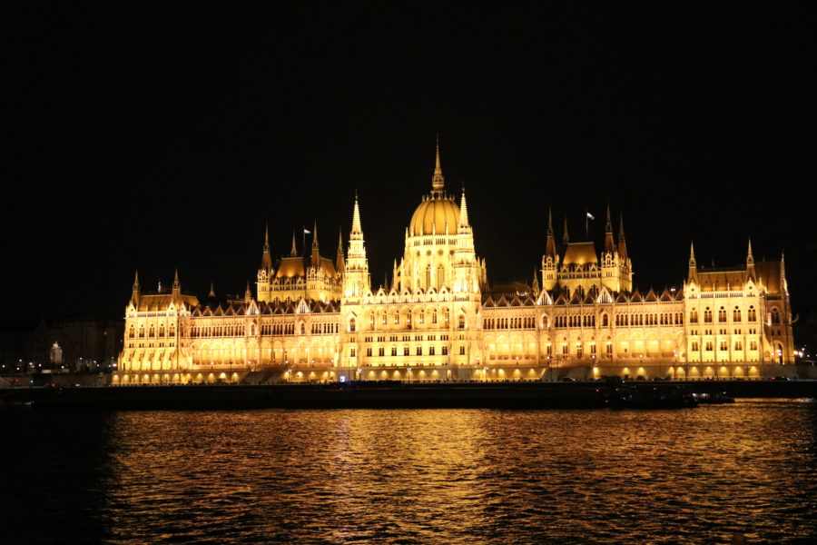 image of Budapest Parliament building lit up at night across Danube