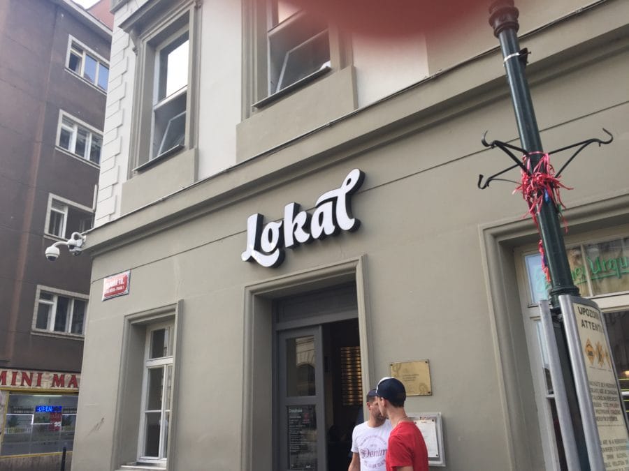 image of outside sign for Lokal restaurant Prague