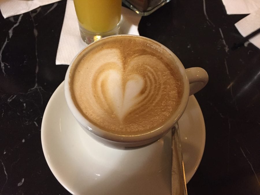 image of latte with foam heart at top