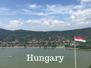 image of Hungarian countryside with flag stating Hungary