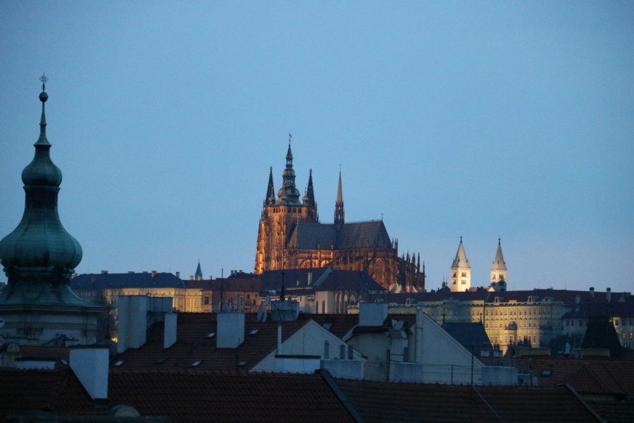 image of St Vitus cathedral glowing at night day 1 of 3 days in Prague Itinerary