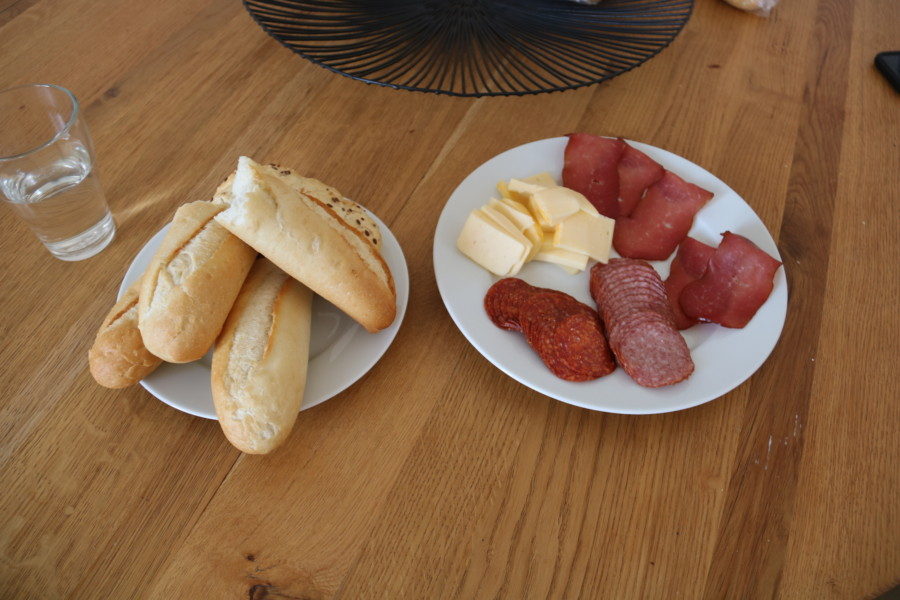 image of plates of cheese meats and breads day 2 Prague Itinerary