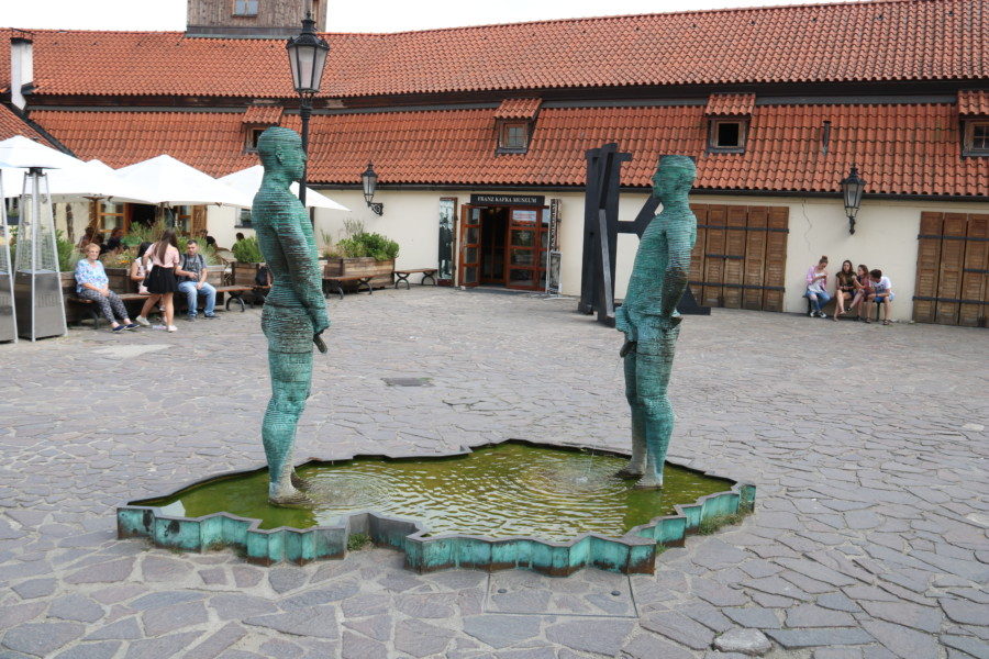 image of two green men peeing into a small puddle shaped like Czech Republic during 3 days in Prague