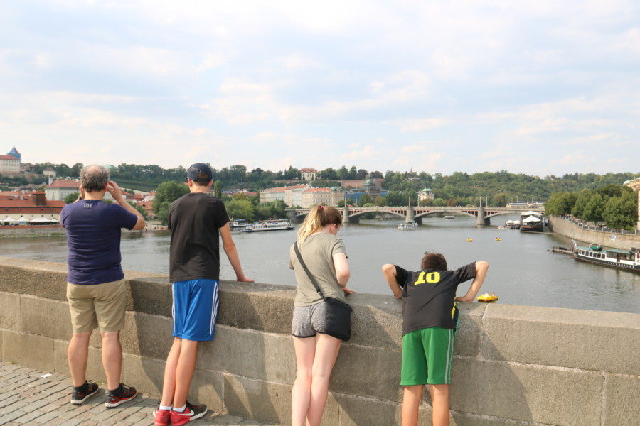 image of family looking out over Charles Bridge