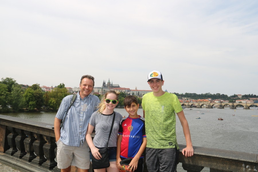 image of family with Prague private guide on bridge