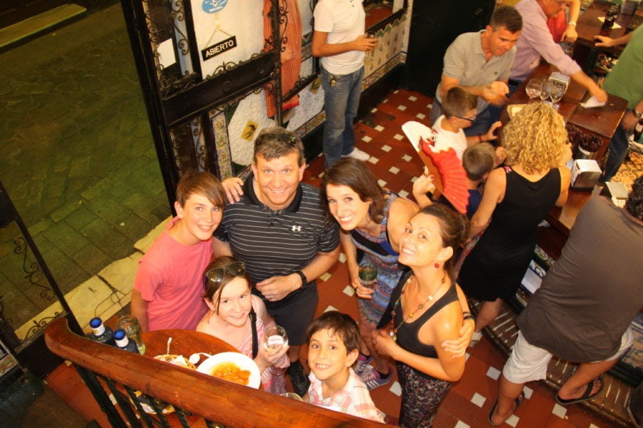 image of family with two private guides in Seville during tapas tour