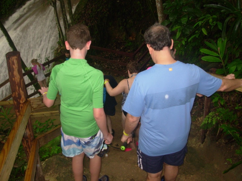 family walking down wooden stairs Jamaica Blue Hole