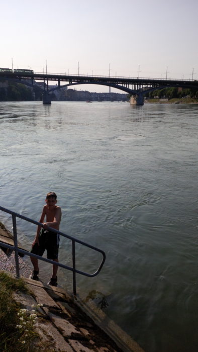 Lucas walking up the stairs after swimming in the Rhine fun things to do in Basel
