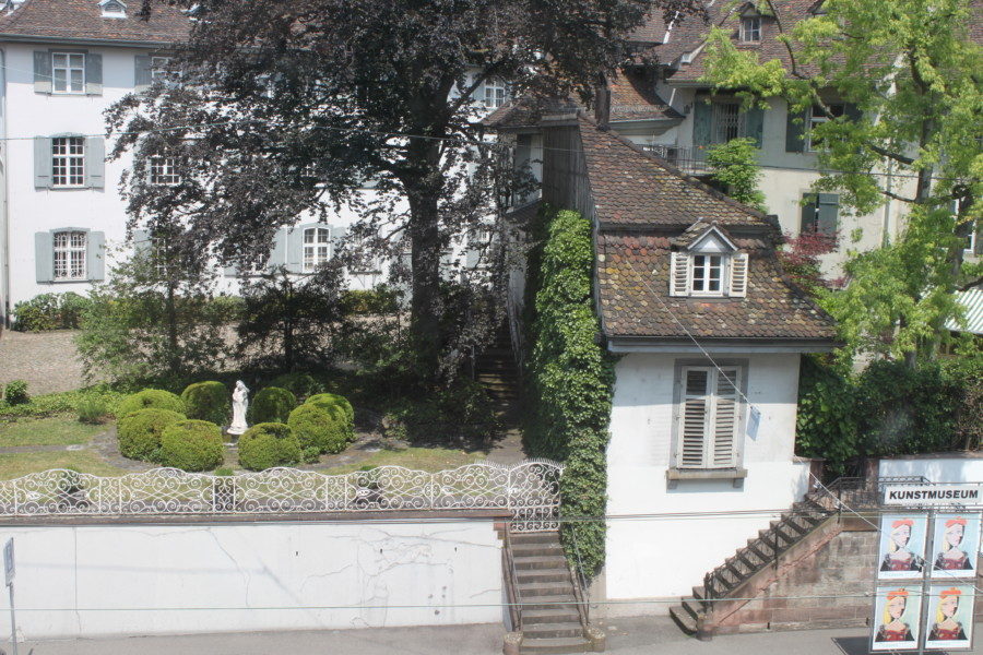 white house cut in half with tree growing on one side is a great free sight in Basel