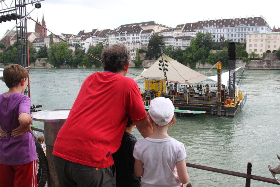 John and Sydney watching a concert on the Rhine things to do Basel