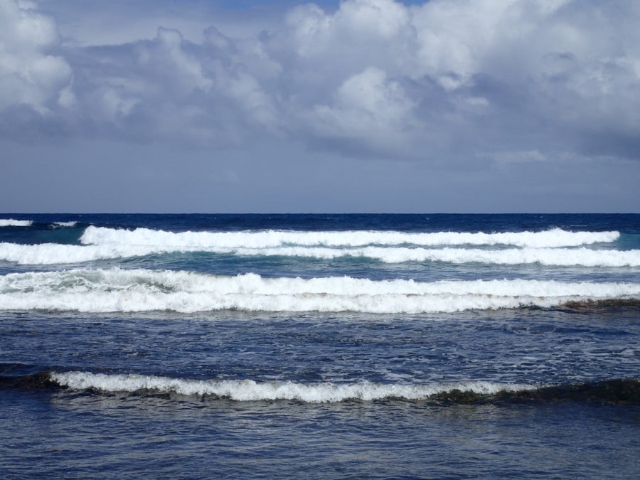 rough waves rolling in blue picture of Barbados