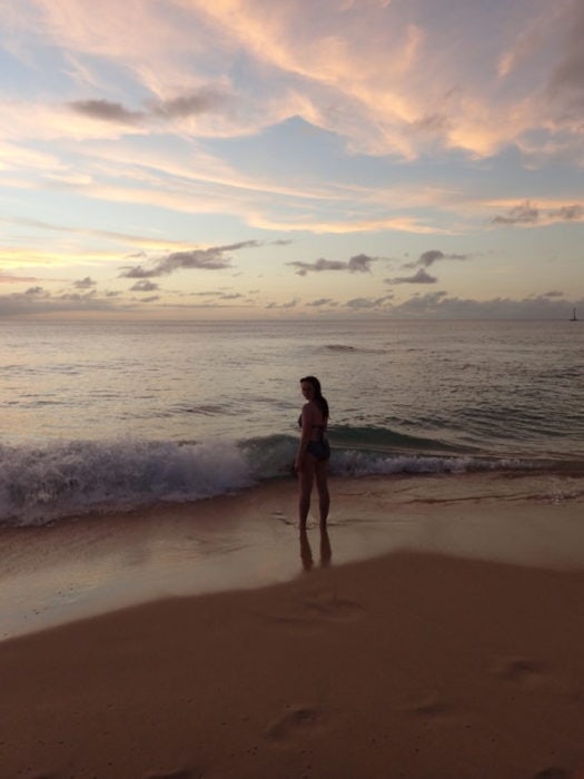 sunset at beach with girl in shadows is most instagrammable locations in Barbados