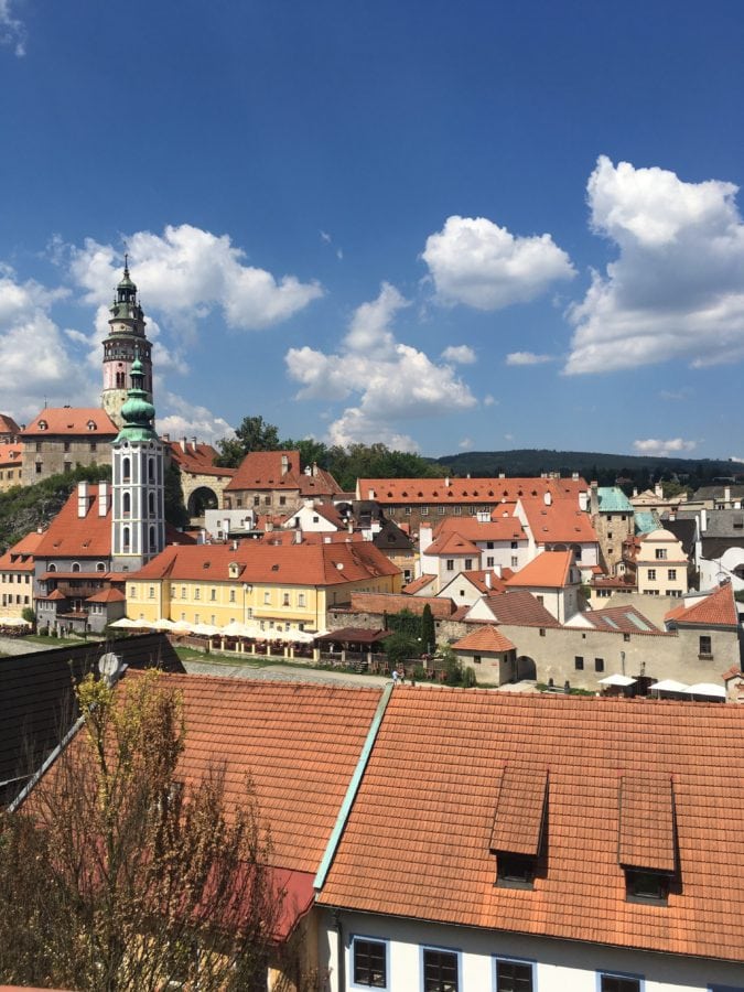 orange roof tops of nearby houses during one day in cesky krumlov