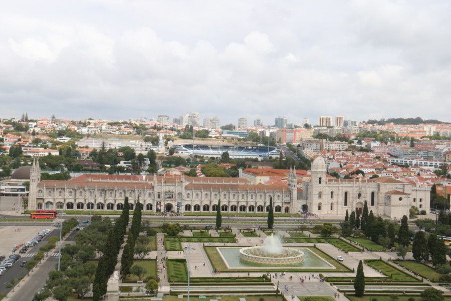 jeronimos monastery in the distance with fountain and park in front