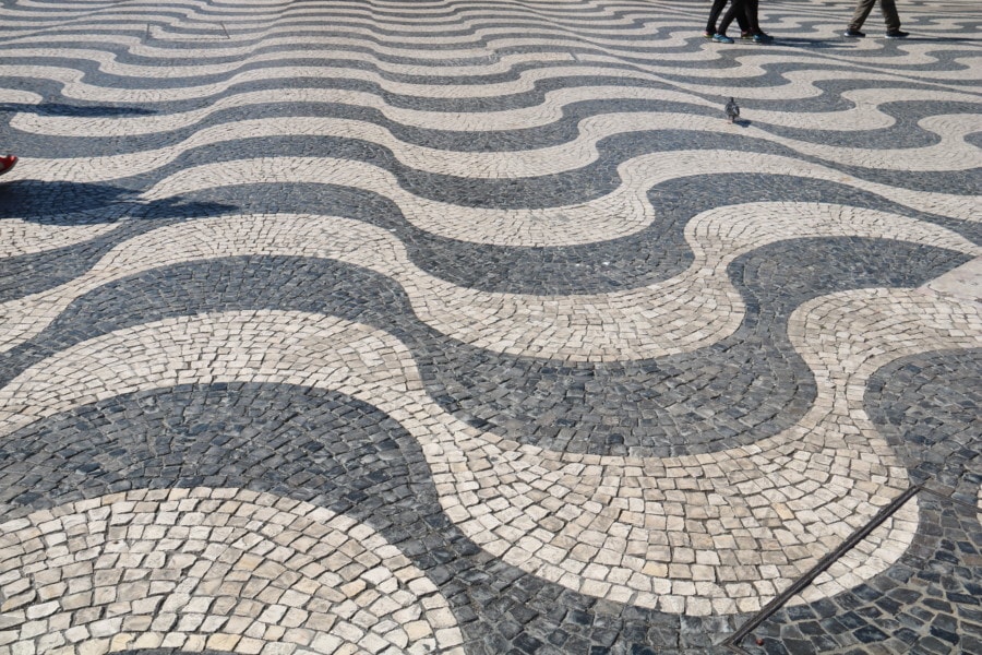 wavy tilework in black and white looks like its moving Lisbon with kids love it