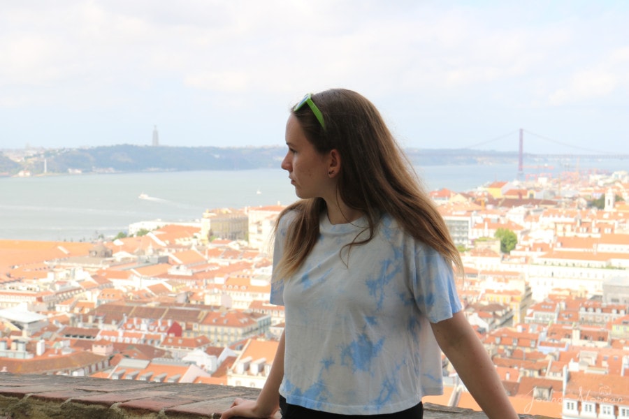 Sydney with view of Lisbon behind her