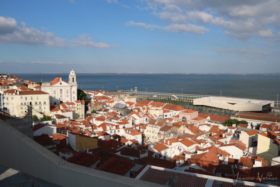 a look over the orange rooftops of Alfama and river