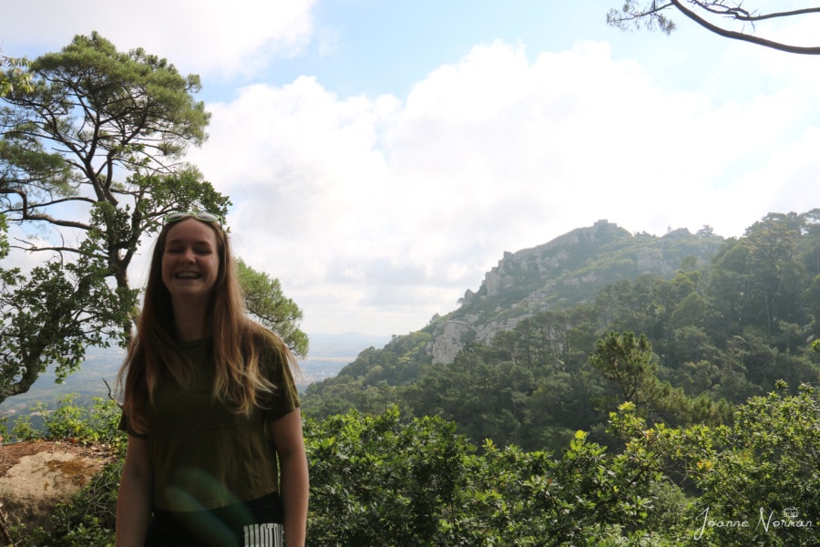 Sydney laughing with Castle of the Moors behind her