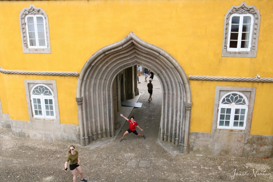 Caiden being funny in decorative archway