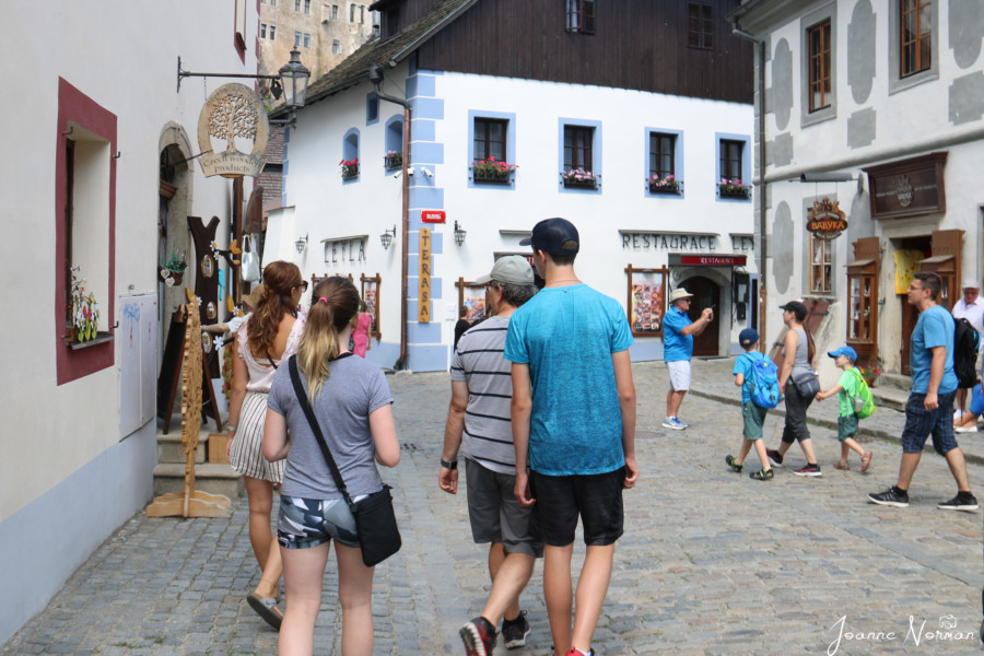 guide with our family walking the streets of cesky krumlov