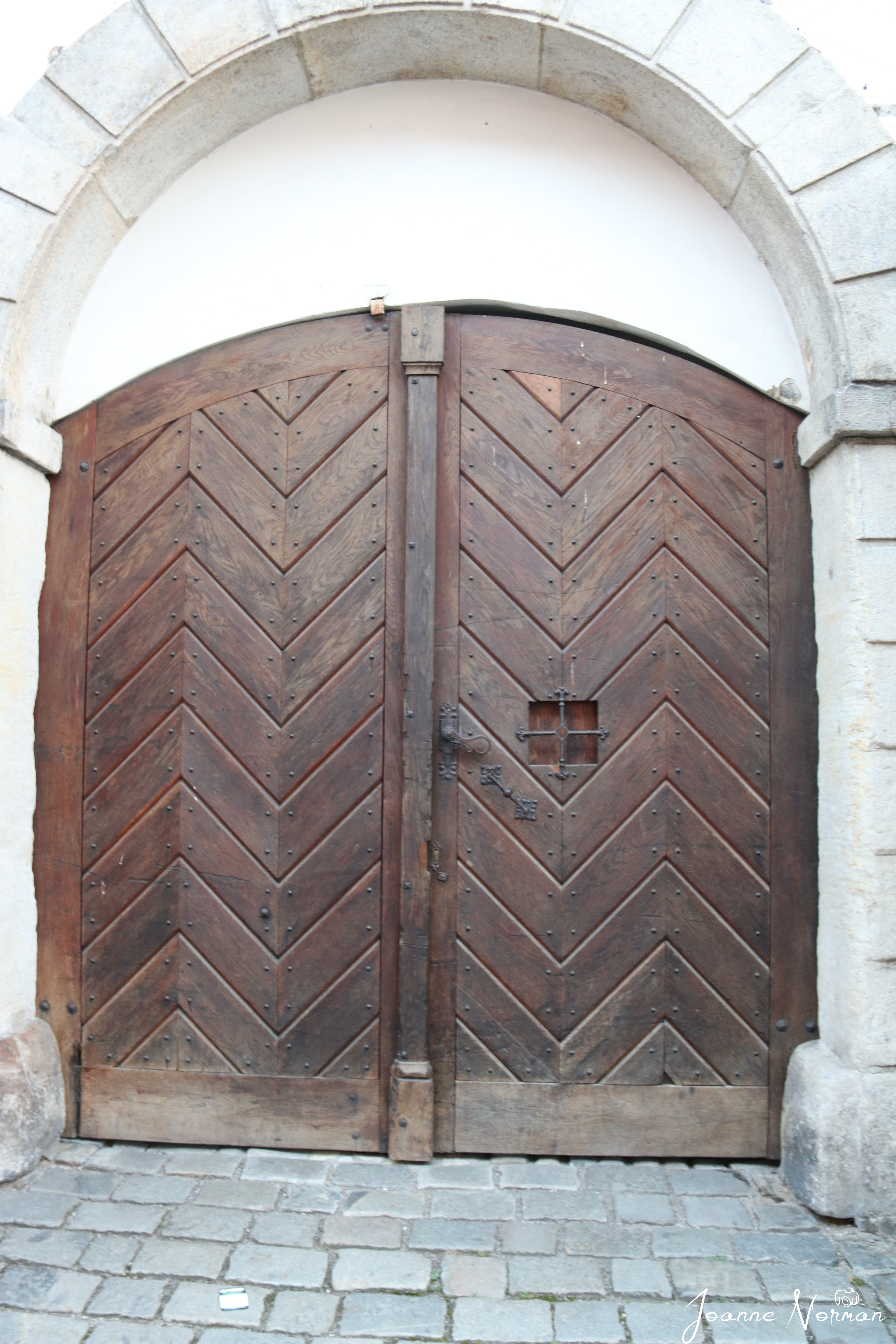 wooden doors with geometric designs things to do in cesky krumlov with kids
