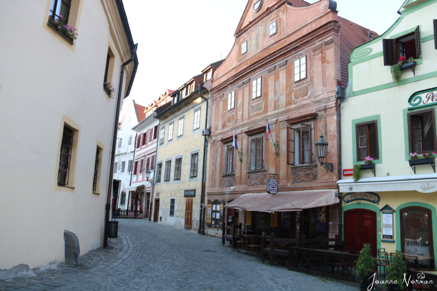empty street with colourful houses in cesky krumlov in morning things to do in cesky krumlov