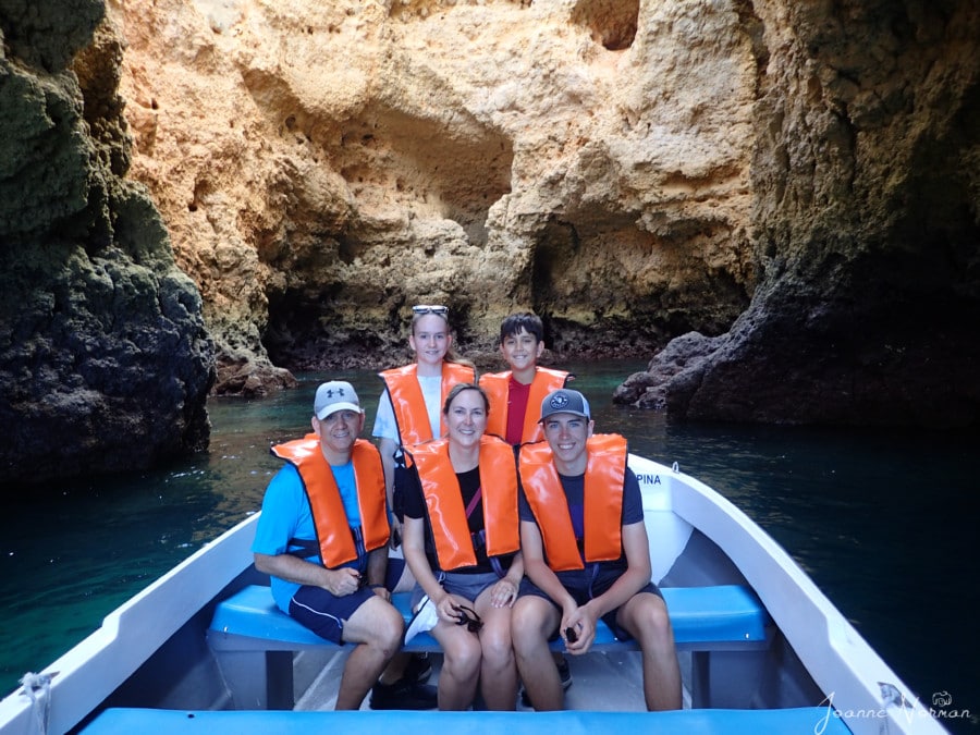 our family in boat getting pic taken in cave Ponta da Piedade Lagos 