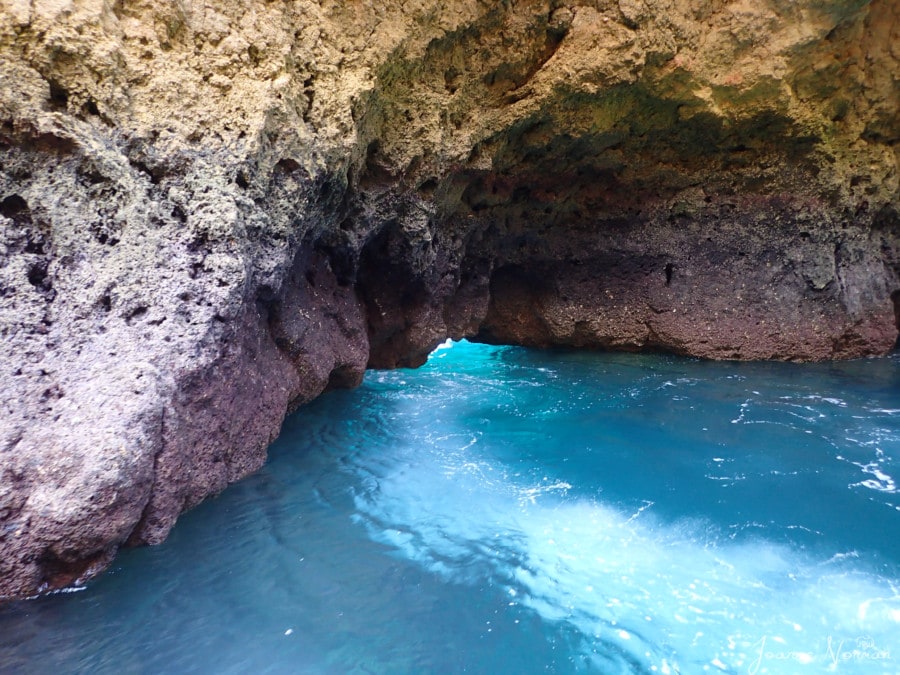 grotto bright blue  water in cave Ponta da Piedade Lagos from Carvoeiro day trip