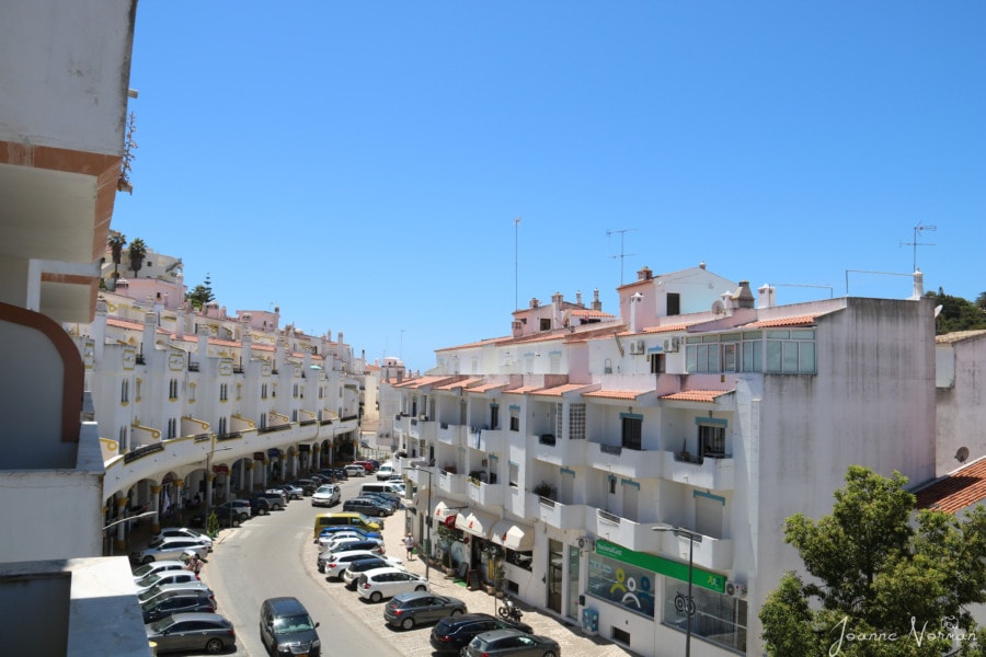 white buildings with orange roofs is village of carvoeiro