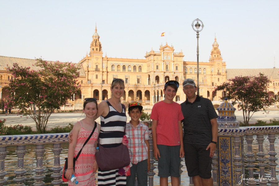 our family in front of large square during Spain with kids